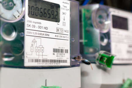 Kilowatt hour stators power company meter.Watthour meter of electricity for use in home.This is a modern technology that can monitor the home's electrical energy consumption.Indoors shot.の写真素材