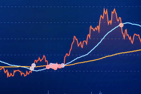 Stock market trading graph in graphic concept.financial investment or economic trends business design. Abstract finance background.Low angle shot.の写真素材