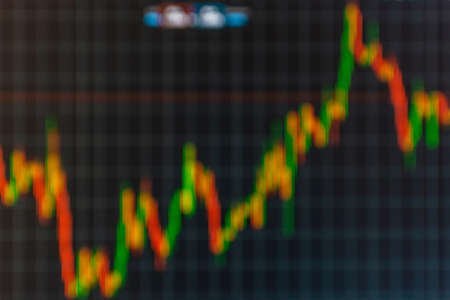 Screen electronic stock exchange online trading platform,blurred background,closeup.