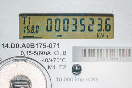 Close-up of modern smart grid residential digital power supply electric power meter counter measuring power usage.Indoors shot.Selective focus.の写真素材