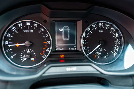 Modern car speedometer,odometer,tachometer and illuminated dashboard. car dashboard modern...