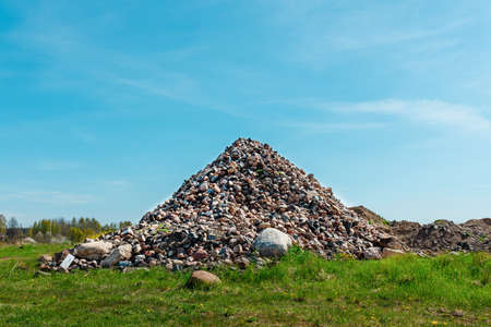 Rock,stones pile for construction, stone pile over blue sky, nice outdoor summer day light.の写真素材