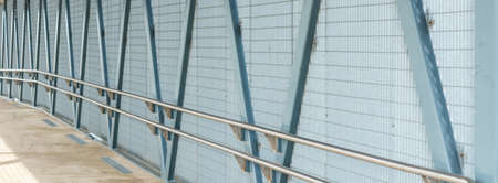 Metal parts of the railway bridge.symmetry of the metal railway bridge.Closeup.Banner.の写真素材