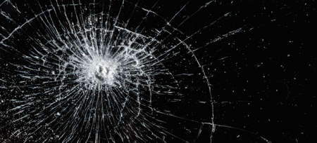 Broken glass texture on black background. Abstract of cracked screen smartphone from shock.Banner,advertisement.の写真素材