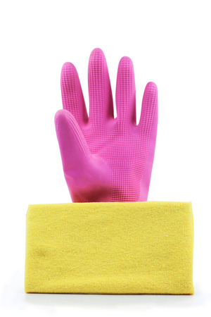 pink rubber gloves and yellow rag isolated on white backgroundの写真素材