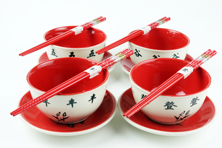 red bowls and red chopsticksの写真素材
