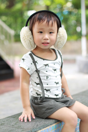 cute little girl in playgroundの写真素材