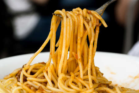 Spaghetti on forkの写真素材