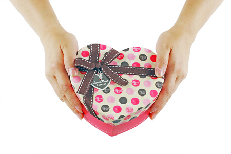 hands holding giftの写真素材