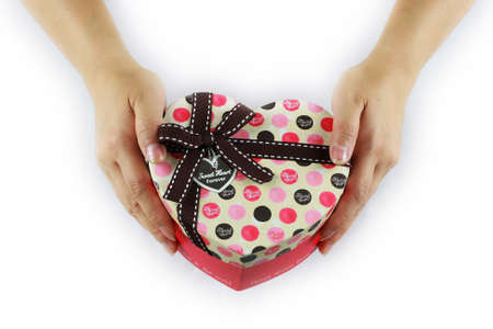 hands holding gift boxの写真素材