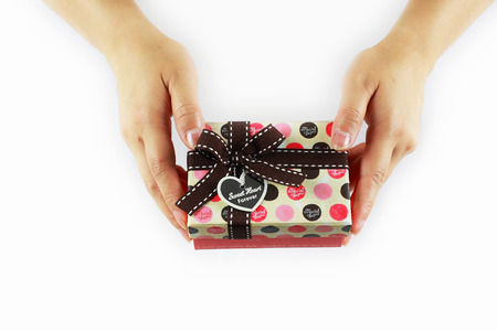 hands holding a giftの写真素材