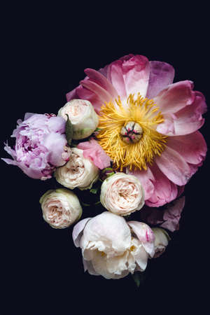 Peonies and roses bouquet. Shabby chic pastel colored wedding bouquet. Closeup view, selective focusの写真素材
