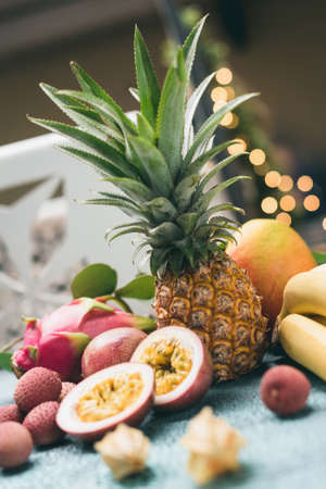 Tropical fruits ananas, lychee, bananas, kiwi, passion fruit and others. Toned image Selective focusの写真素材