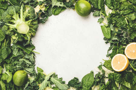 Fresh green leaf salad frame with copy space for text, menu or recipe. Healthy eating, vegan or vegetarian food conceptの写真素材