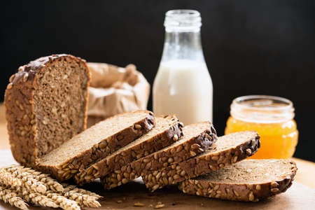 Rye bread with sunflower seeds sliced. Delicious fresh bread, rustic food still life