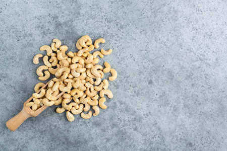 Raw cashew nuts on concreteの写真素材