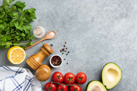 Vegetables and spices cooking background. Fresh ingredients for cooking healthy meal. Top view copy...