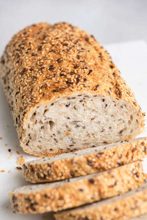 Multigrain bread with seeds. Sliced wheat bread with nuts and seeds