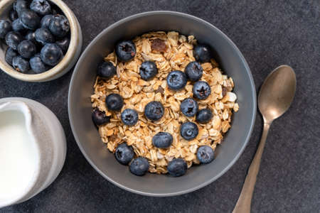 Bowl of muesli with blueberries top view. Healthy breakfast cerealsの写真素材
