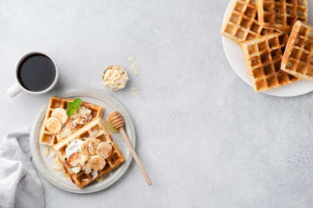 Banana Caramel Belgian Waffles On Plateの写真素材