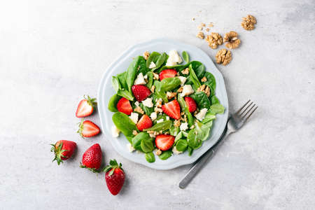 Salad with strawberries, feta cheese and walnutsの写真素材