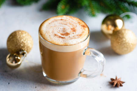 Christmas Cup of cappuccino coffee with cinnamon