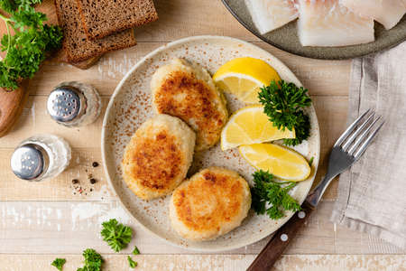 Fish cakes, patties or cutlets on a plateの写真素材