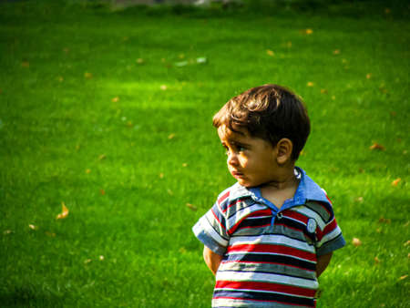 An oppressed little boy in Mellat park "10 May 2013Tehran  Iran"のeditorial素材