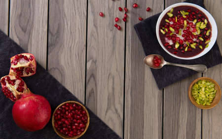Pomegranate desert with Chia Seed, tapioca pudding and Yogurt. healthy eating. top view. copy space.の写真素材