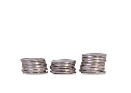 Three Stacks of silver Ukrainian coins, isolated over whiteの写真素材