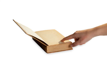 The woman points a finger in the bookの写真素材
