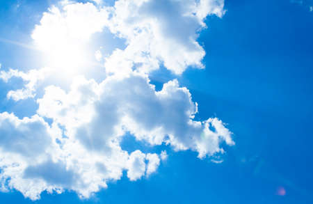 blue sky background with tiny clouds