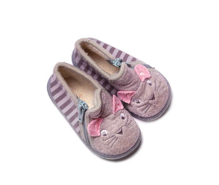 Baby girl pink shoes isolated on white backgroundの写真素材