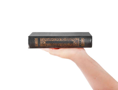 Hand with book isolated on white backgroundの写真素材