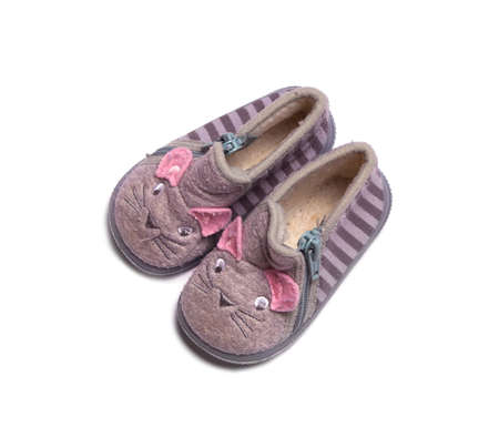 Baby girl pink shoes isolated on white backgroundの写真素材