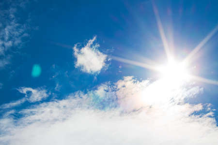 Blue sky with cloudsの写真素材