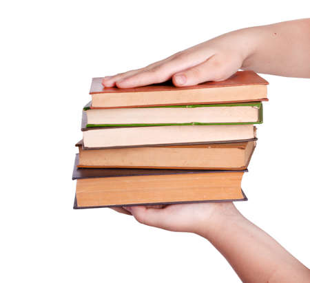 hand giving pile of book as a gift of knowledgeの写真素材