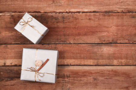 Christmas decoration with presents on wood boardの写真素材