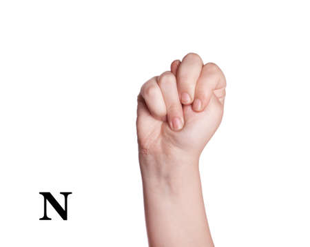 Finger Spelling the Alphabet in American Sign Language (ASL). The Letter Nの写真素材