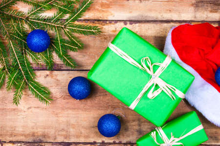 Christmas decoration with presents on wood boardの写真素材