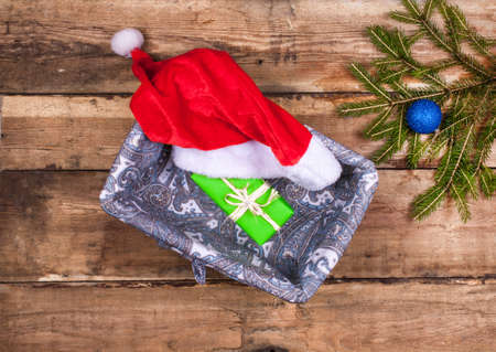 Christmas decoration with presents on wood boardの写真素材