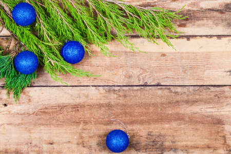 Christmas decoration with presents on wood boardの写真素材