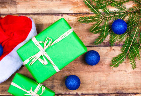 Christmas decoration with presents on wood boardの写真素材