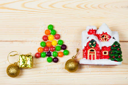 Christmas wooden background with candies.の写真素材