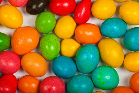 Close up of a pile of colorful chocolate coated candyの写真素材