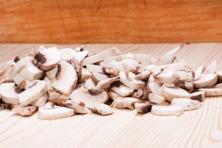 Many mushrooms on wooden table. Top viewの写真素材