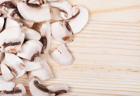 Many mushrooms on wooden table. Top view .の写真素材
