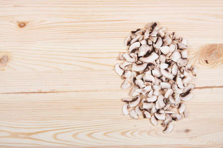 Many mushrooms on wooden table. Top view .の写真素材