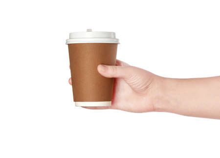 Brown cup of coffee in handの写真素材