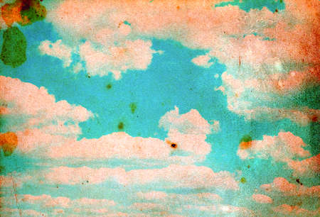 grunge image of blue sky with cloudsの写真素材